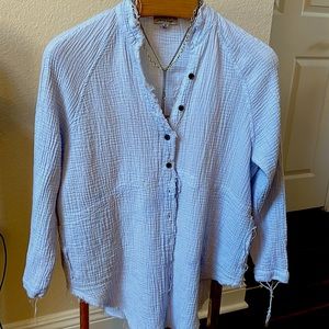 great for layering, perfect baby/light blue color 
textured, comfy button down